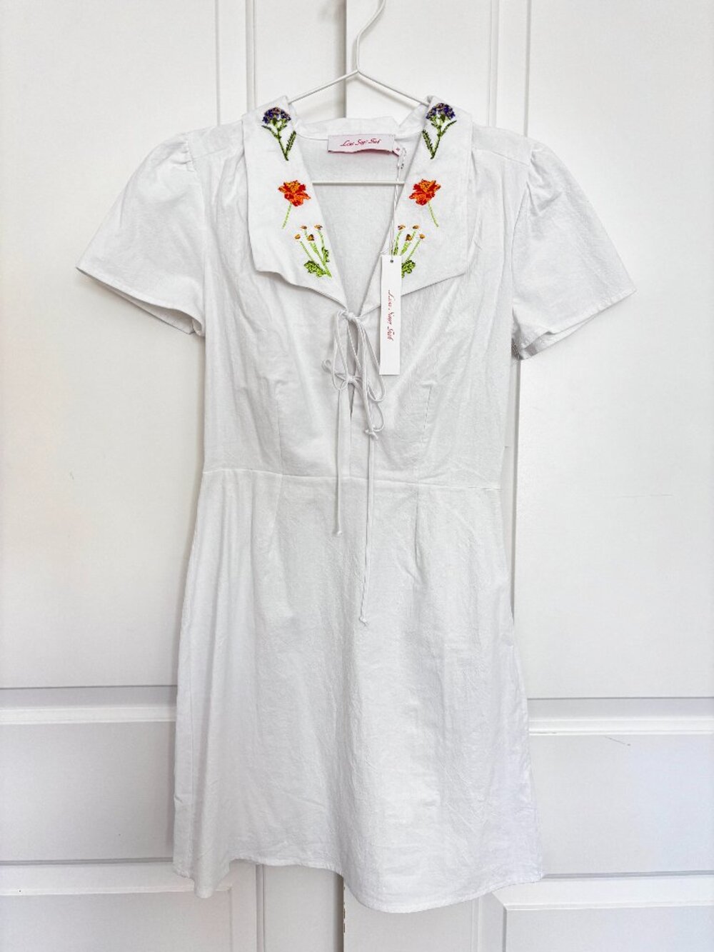 Lisa Says Gah white cotton mini dress, brand new with tags — never worn.  Oversi